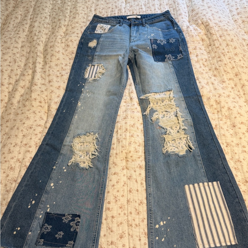 Altar'd State Two-Tone Patchwork Flare Jeans